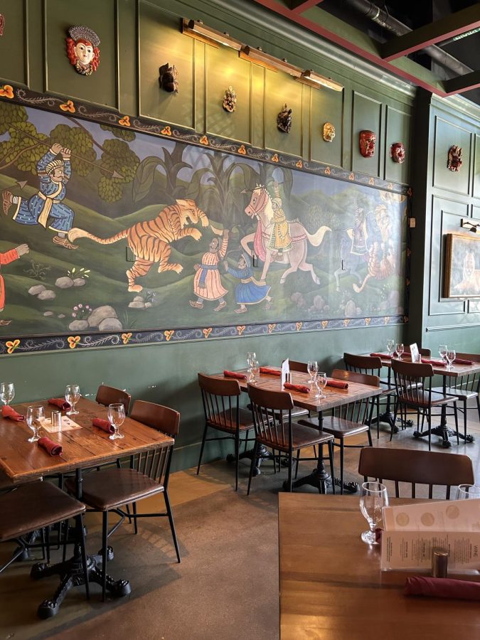 The decor inside Jaipur is both cozy and inviting; the mural on the back wall of the Dundee location is the same as appears in their original location in Rockbrook Village. 