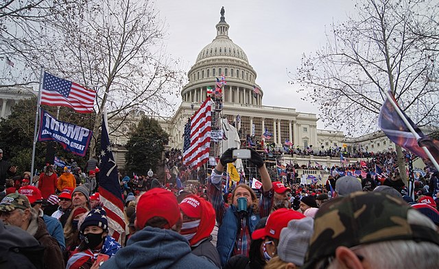 A group of rioters gather outside the U.S. Capitol.
Photo credit: Tyler Merbler