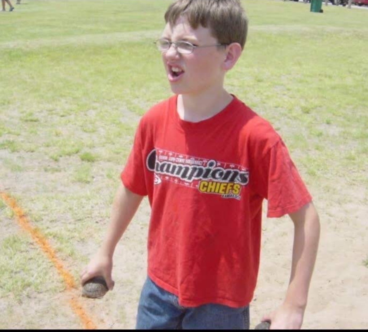 Young Mr. Sanders holding two box turtles. (2004)