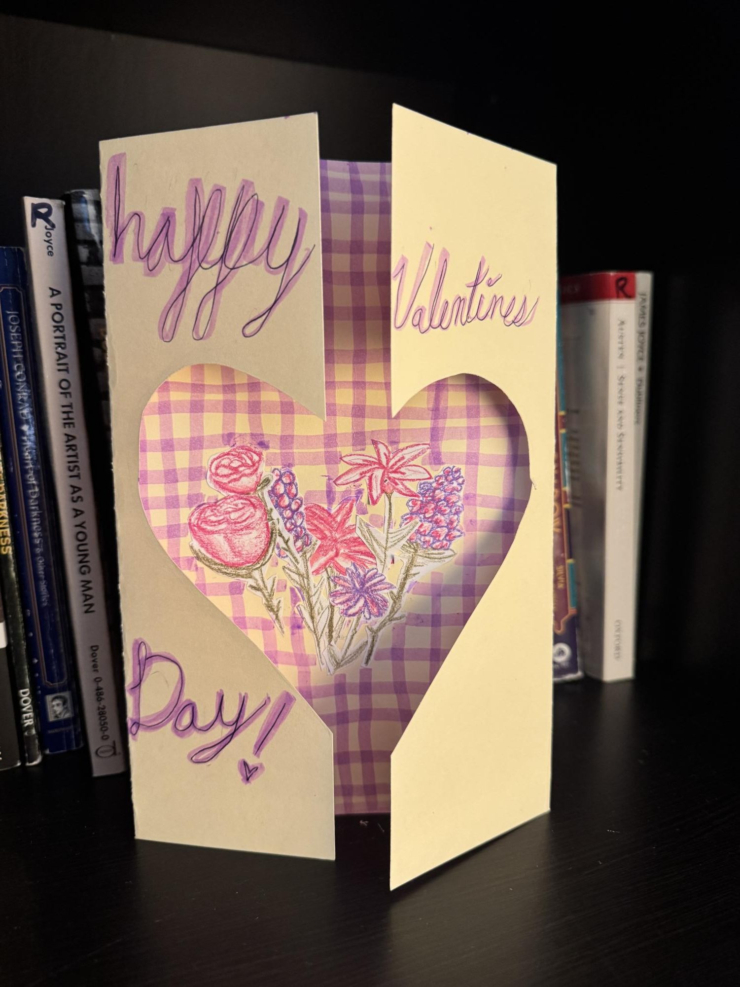 Finally take some color and add details to the front of the card—possibly a heartfelt message. Since the card is finished, it can be given to a loved one on Valentine's day!