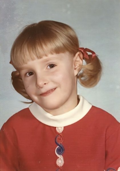 Young Mrs. Rise smiling for the camera. 
