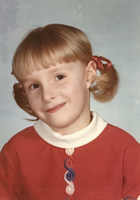 Young Mrs. Rise smiling for the camera. 